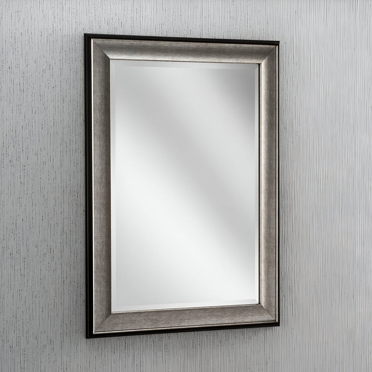 The Pulse Rectangle Wall Mirror - Grey features a modern frame and graces a light-textured wall, radiating subtle elegance while effortlessly complementing the minimalist decor.