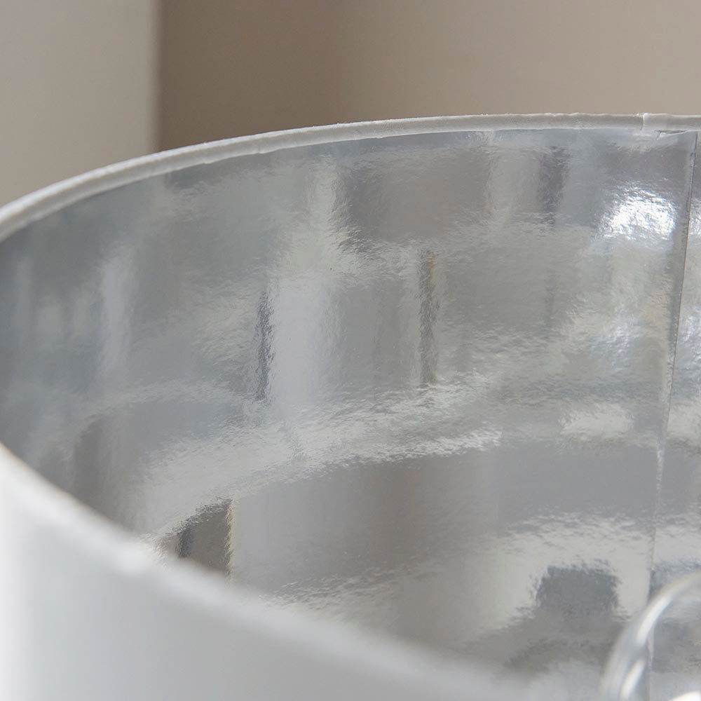 Danefield Table Lamp close-up showing the cream fabric shade's silvered chrome-effect inner lining with visible seam.