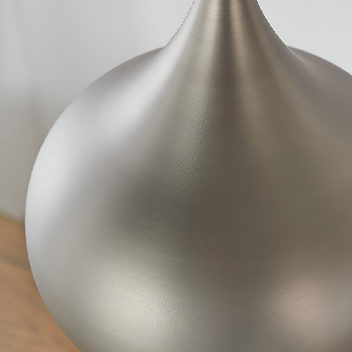 Close-up of the Ashleigh Pendant in matt nickel, showing its smooth, bulbous metal shade with a tapered curved neck against a plain white background.