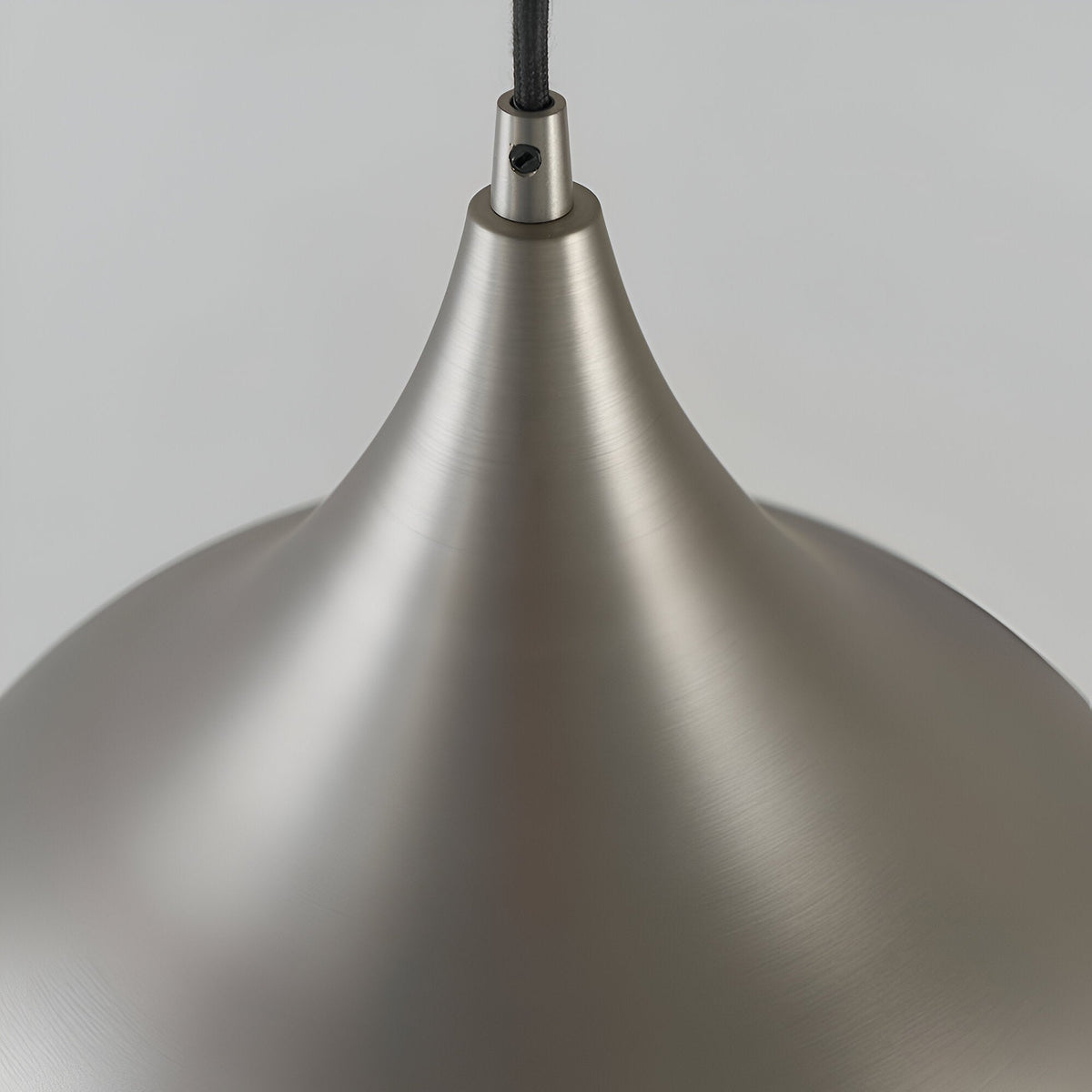 Close-up of the Ashleigh Pendant in matt nickel, showing the tapered dome shade and cable entry against a plain light grey background.