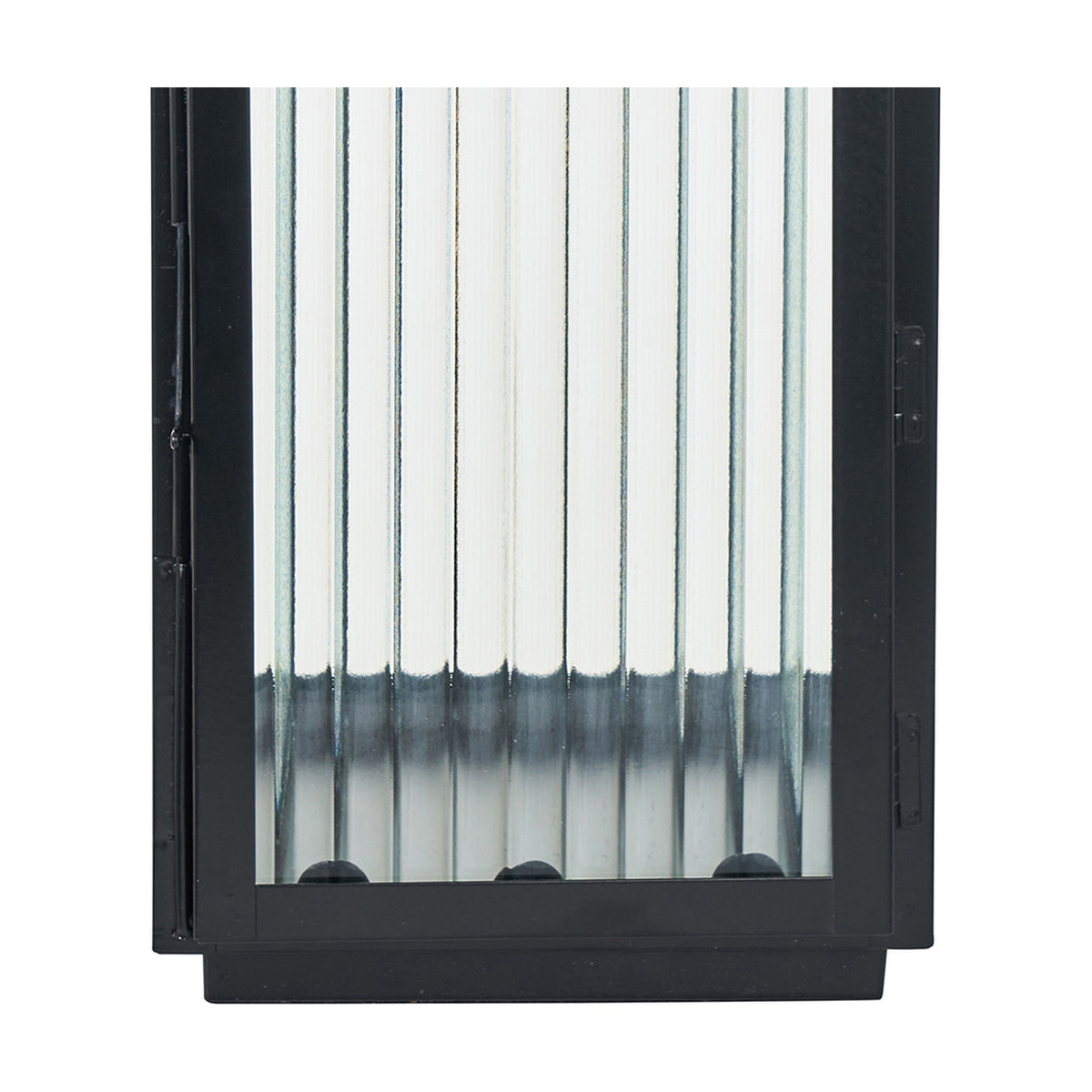 Black iron candle lantern with vertical ribbed glass panels and hinged door detail, shown close-up against a plain white background.