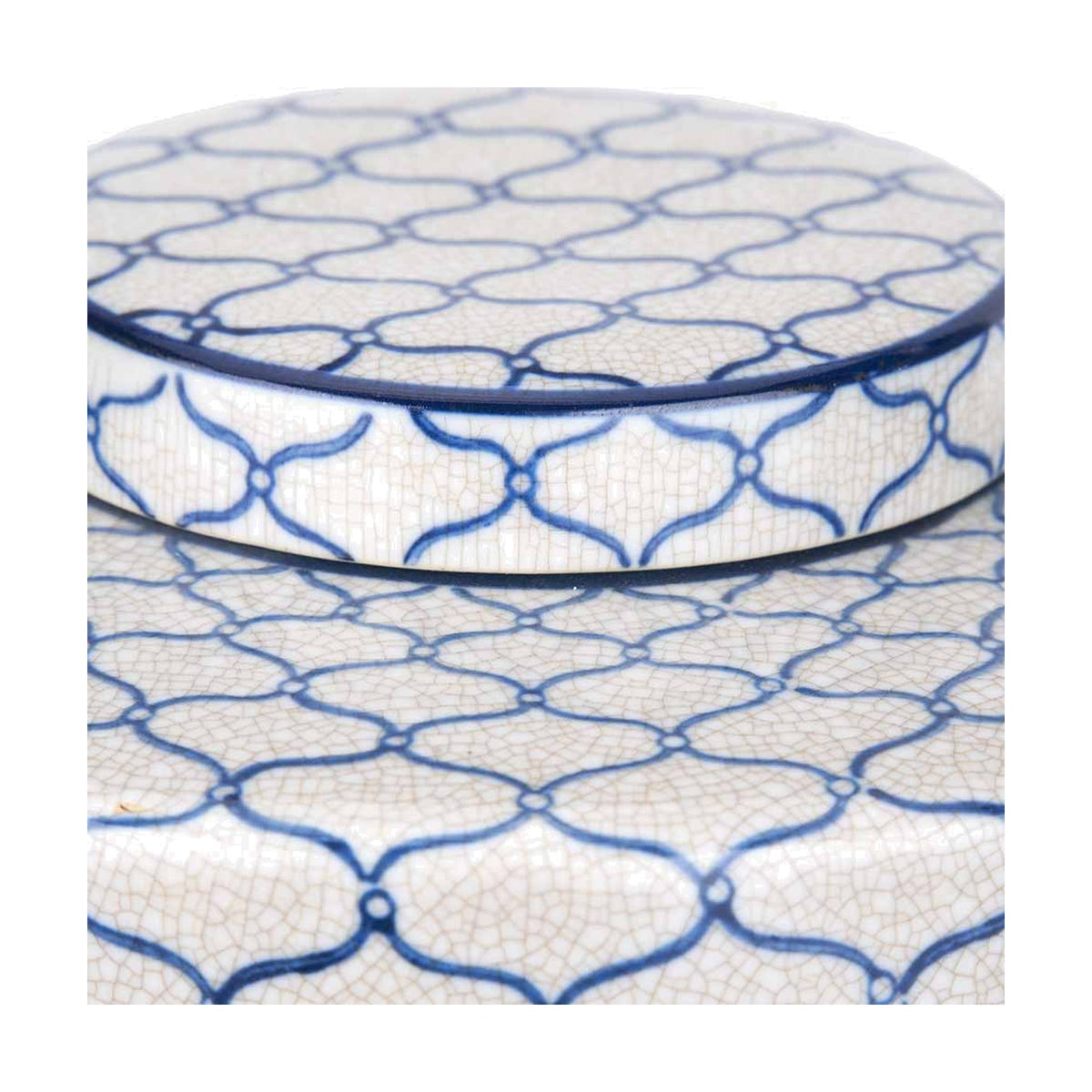 Close-up of the Demetri ceramic lidded ginger jar, 24cm, showing crackle-glazed white surface with blue trellis pattern and lid rim detail.