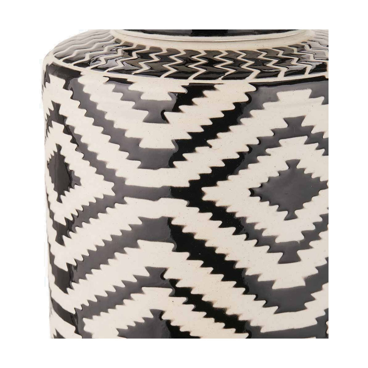 Close-up of the Chirala ceramic ginger jar's lidded neck and body, showing a black and white geometric Aztec zigzag and diamond pattern.