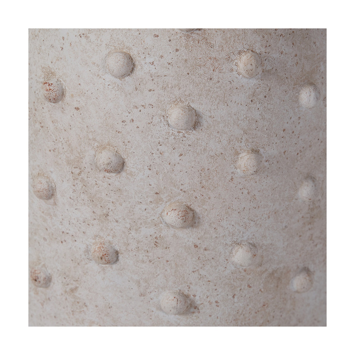 Close-up of the Kali Textured Dot Light Grey Stoneware Vase, showing raised dot detailing on a matte grey ceramic surface.