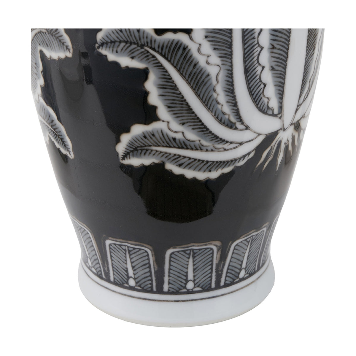 Close-up of the Black & White Feather Ceramic Urn Vase Asteria, showing hand-painted leaf detail and a scalloped white footed base against a plain background.