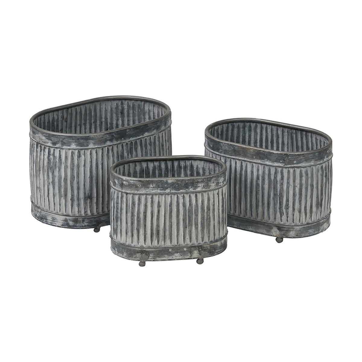Set of three oval planters in galvanised zinc with ribbed sides and small feet, shown in graduated sizes on a plain white background.