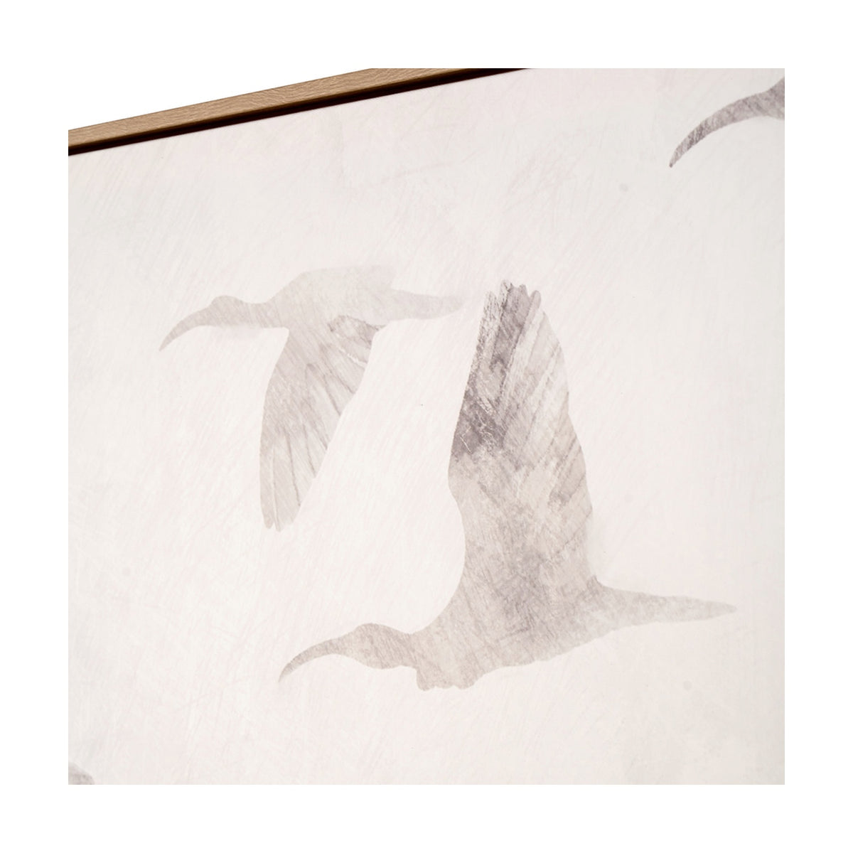Corner detail of natural canvas wall art in a wood frame, showing muted grey silhouettes of birds in flight against a white background.