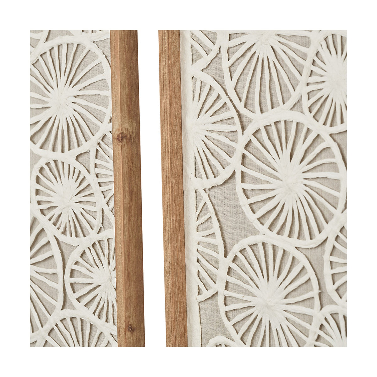 Close-up of the Set of 2 Cut Out Pattern Natural Paper Design Wall Art, showing wheel-like radial designs on natural fabric within wood frames.