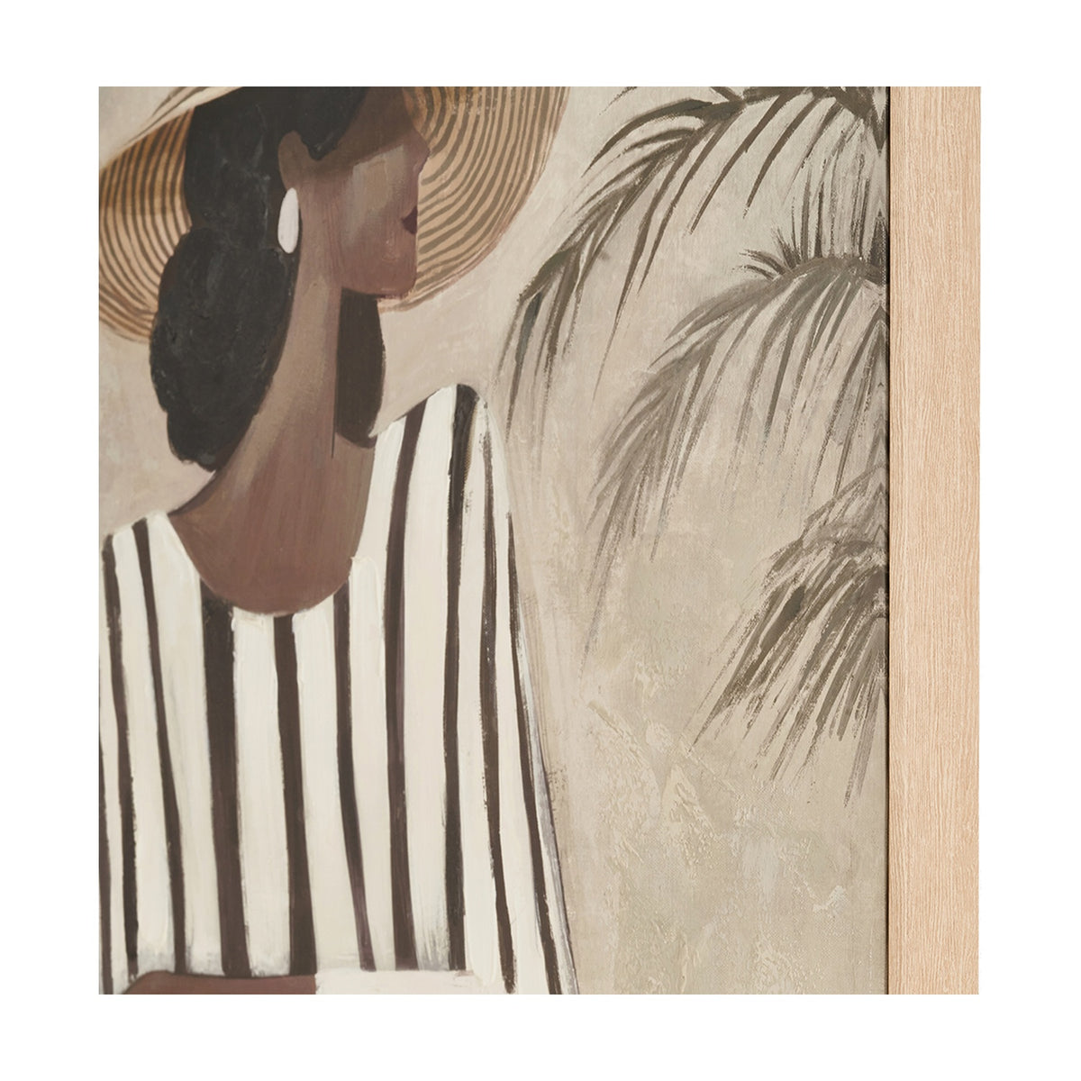 Canvas wall art print with natural wood frame, showing a close-up of a woman in a striped dress and sun hat beside painted palm leaves in earthy tones.