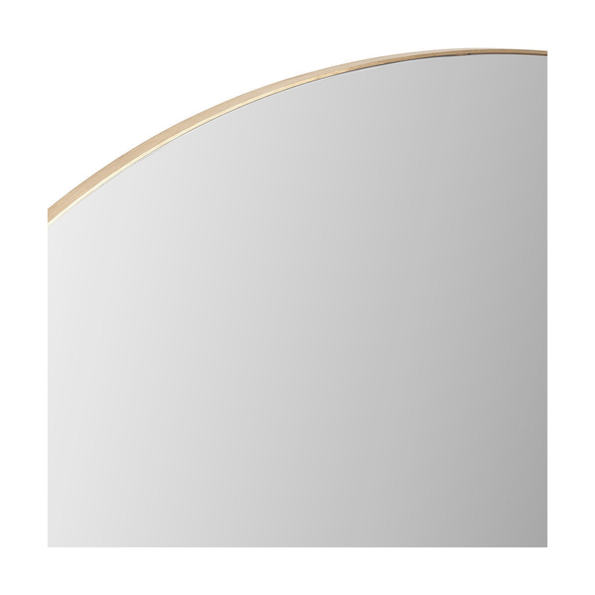 Close-up of the Slim Frame Brushed Gold Metal Wide Arch Wall Mirror, showing the curved top corner with a slim brushed gold metal frame against a plain white background.