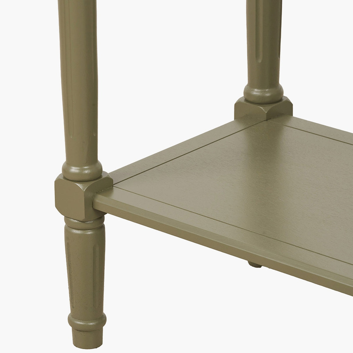 Close-up of the Heritage Olive Pine Console Table's turned wooden legs and lower shelf joinery in a matte olive green painted finish, on a plain white background.