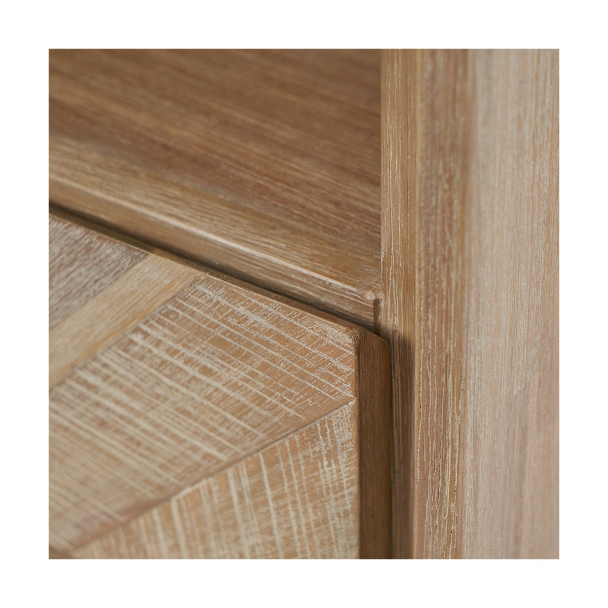Close-up of the Marca Sand Wash Acacia 1 Drawer Shelving Unit, showing the wood grain finish and joinery detail where the drawer front meets the frame.