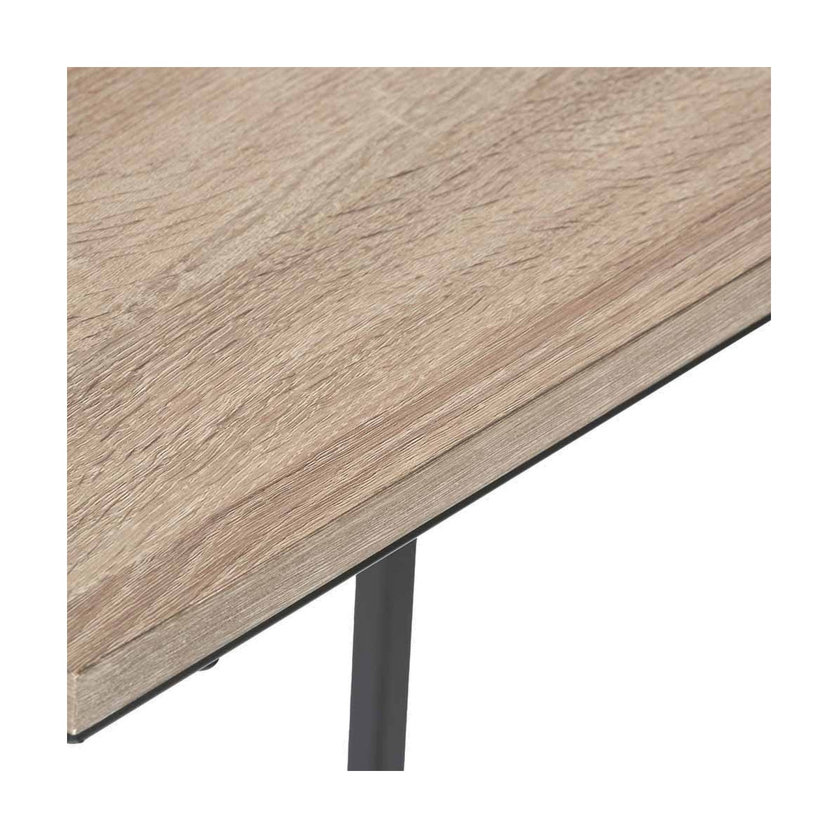 Close-up of the Soho Side Table's natural wood veneer top edge meeting a black iron leg, showing wood grain detail against a plain background.