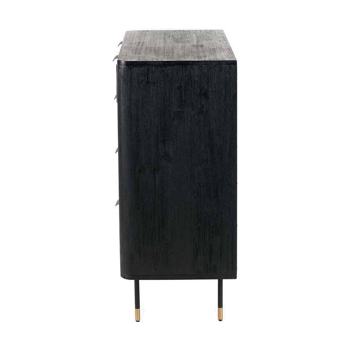 Side view of the Fiji Black Acacia & Rattan 4 Drawer Unit, showing a solid black wood panel side and top surface, with slim metal legs featuring brass tips, on a plain white background.