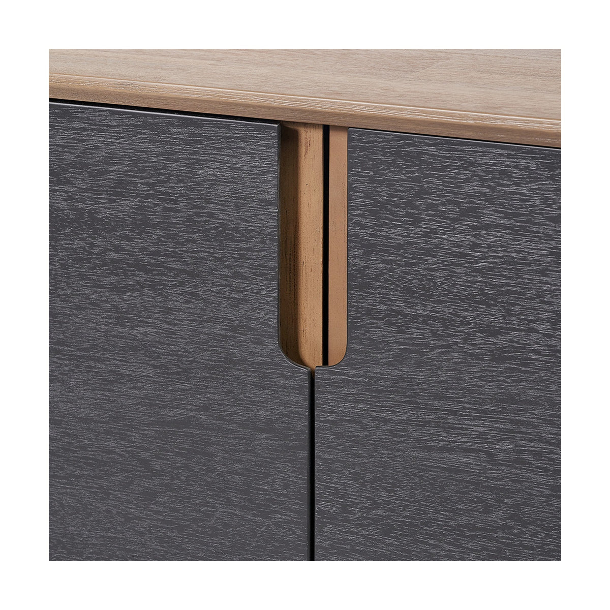 Close-up of the Gio Black & Acacia 4 Door Sideboard, showing a black woodgrain door front with a curved acacia wood handle set against a natural wood top.