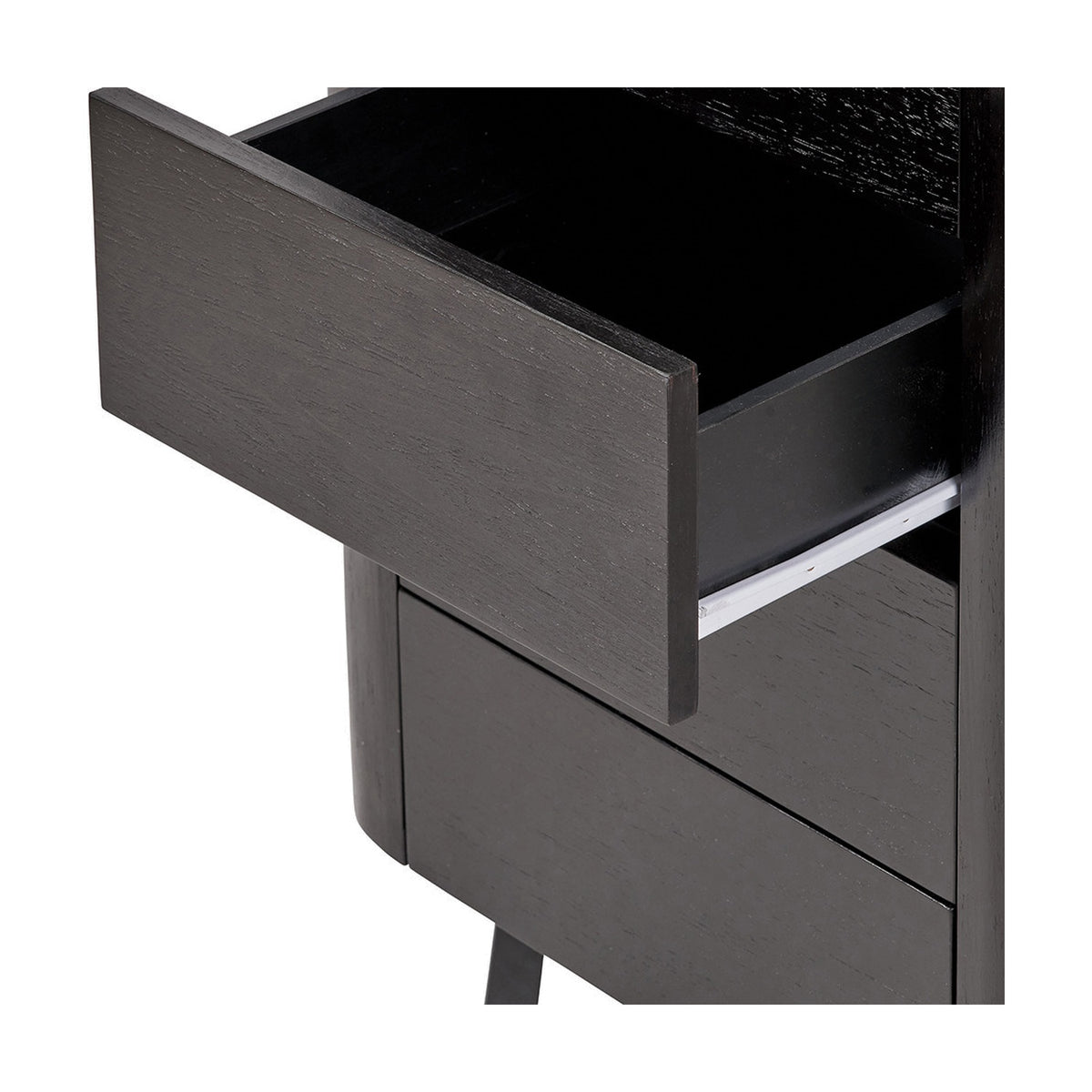 Close-up of the Ukiah black ash veneer chest of drawers showing an open drawer with metal slide runners and rounded corner detailing on a plain background.