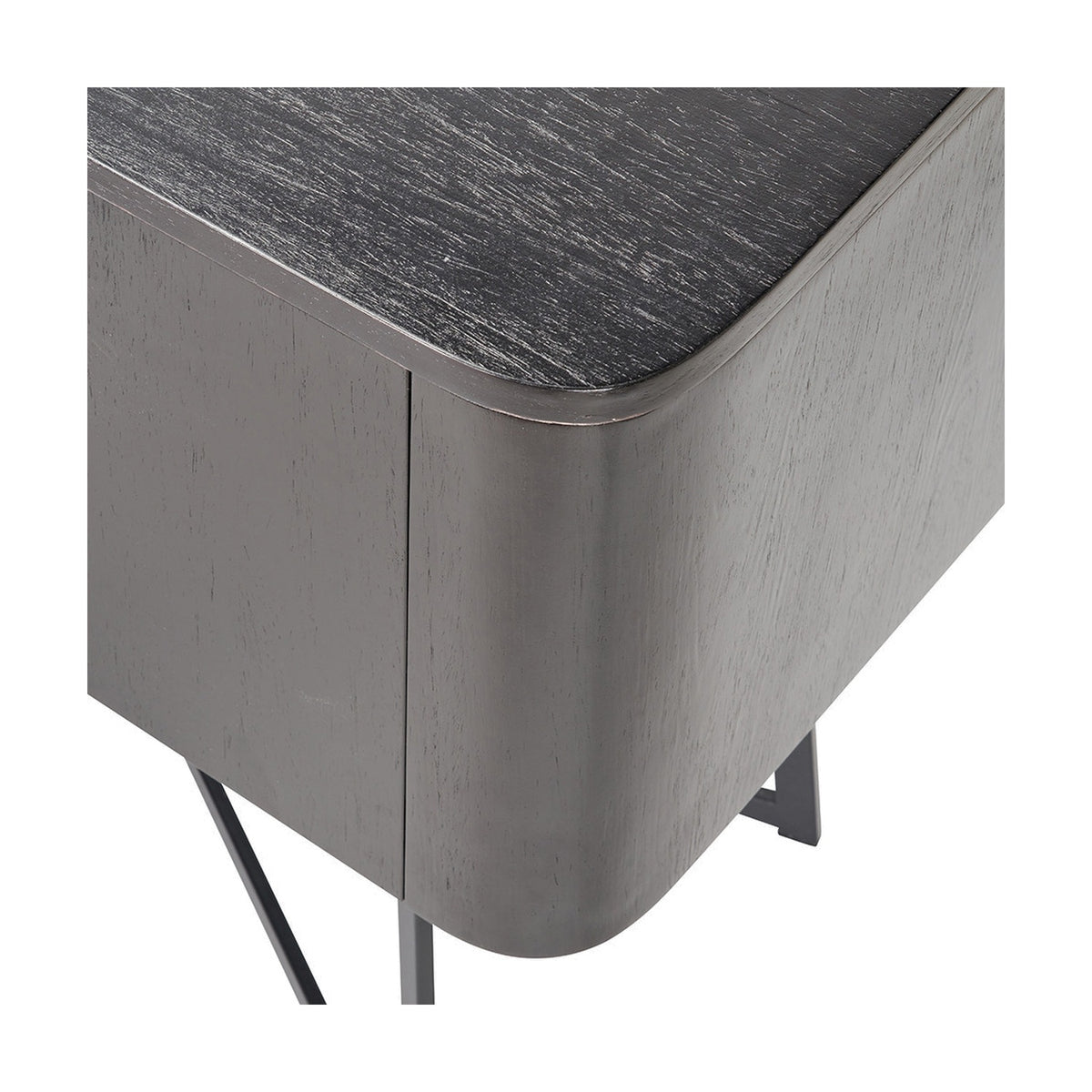 Close-up of the Ukiah black ash veneer sideboard's rounded corner, showing the wood-grain top, angled metal leg, and door seam detail.