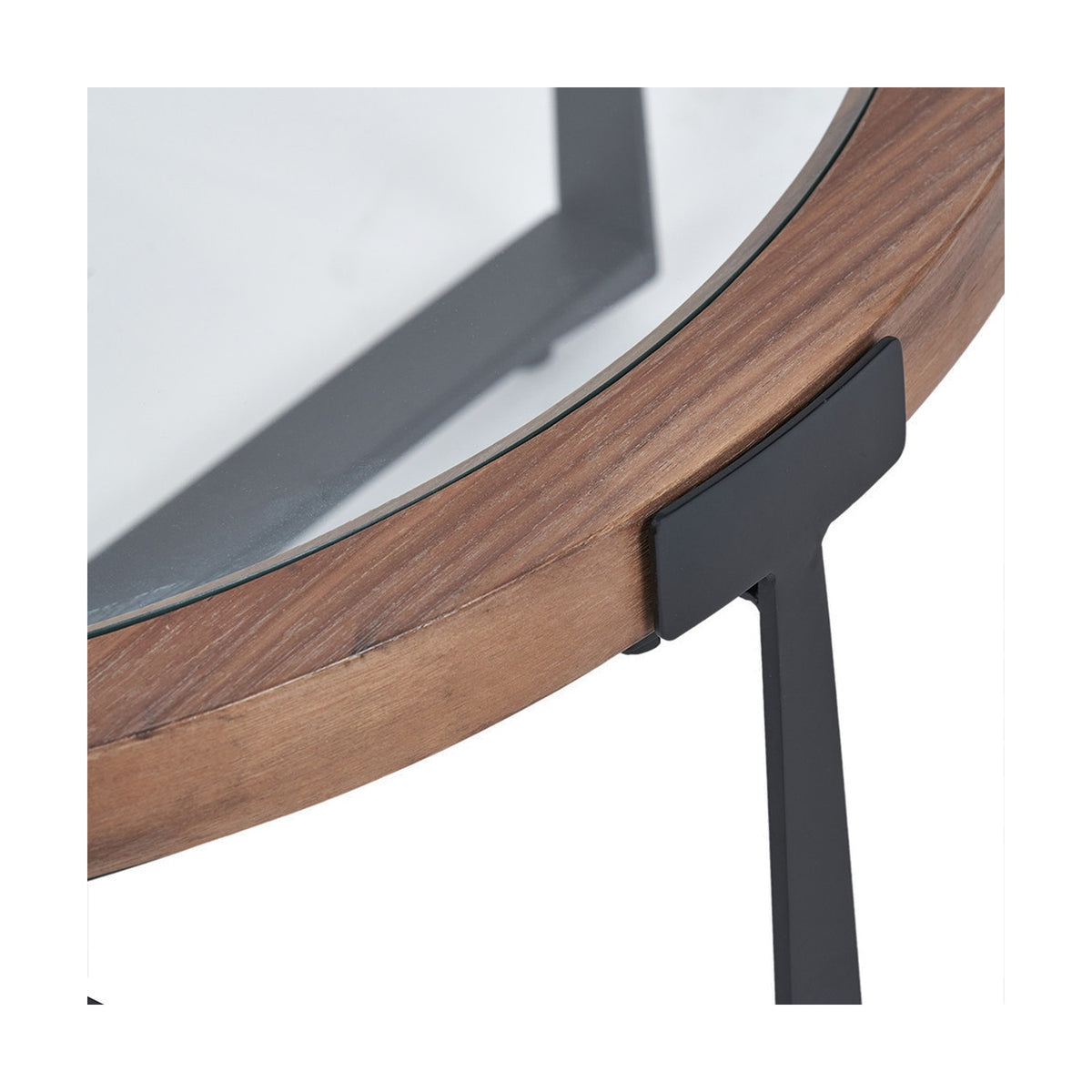 Close-up of the Vermont coffee table's edge, showing clear glass set into a light walnut wood veneer rim with a matte black metal leg bracket.