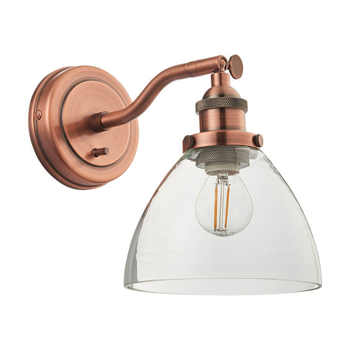 Endon Wentworth adjustable wall light in copper with knurled lamp holder, clear glass dome shade and visible E14 filament bulb on a white background.