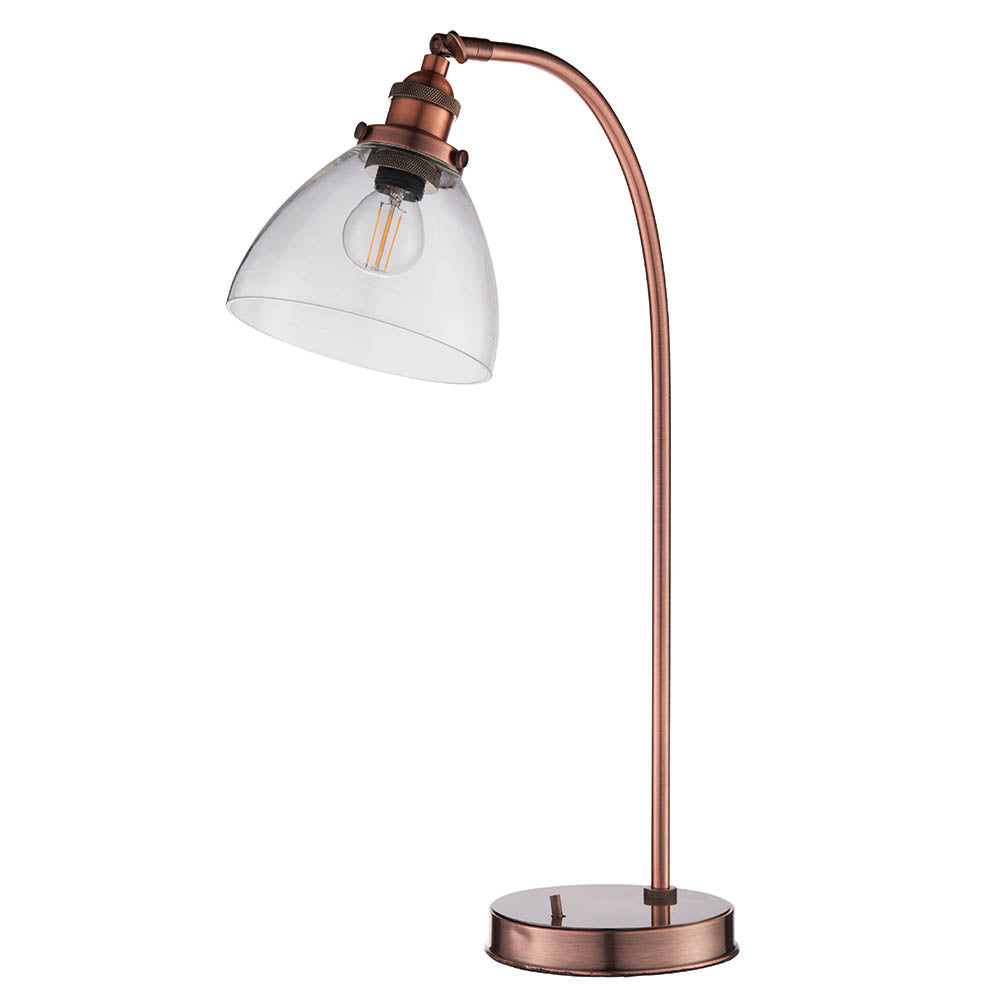 Endon Wentworth industrial table lamp in copper with arched stem, clear glass dome shade, knurled E14 lamp holder and round base on a white background.