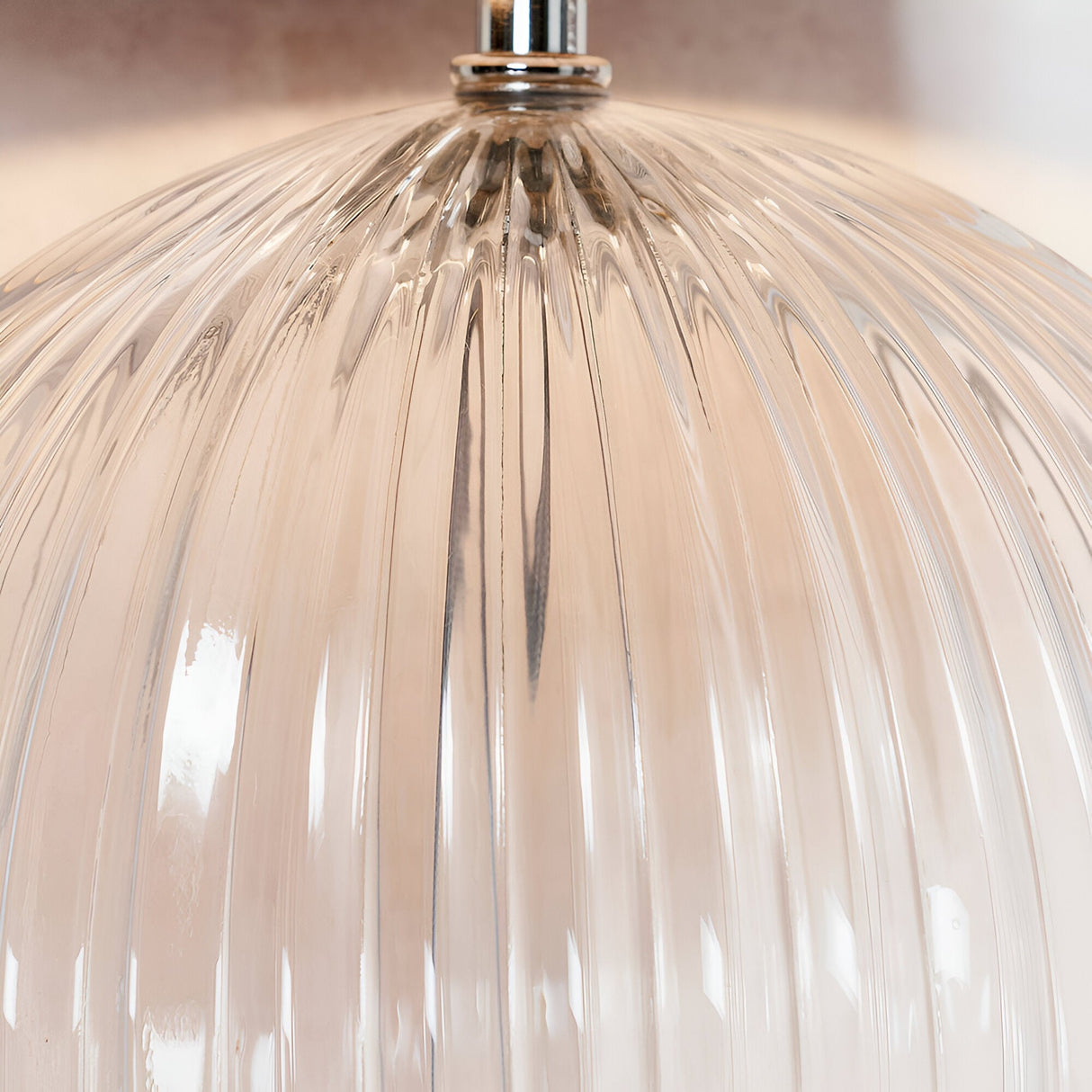 Close-up of the Endon Brockdale table lamp base showing the clear ribbed glass dome and satin nickel plated neck fitting.