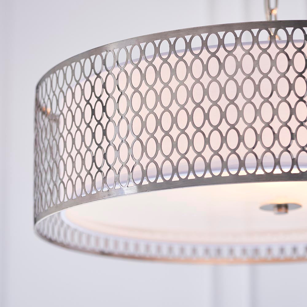 Close-up of Endon Rosaline 3 Light Pendant showing satin nickel circular fretwork drum shade with white fabric inner and frosted glass diffuser.