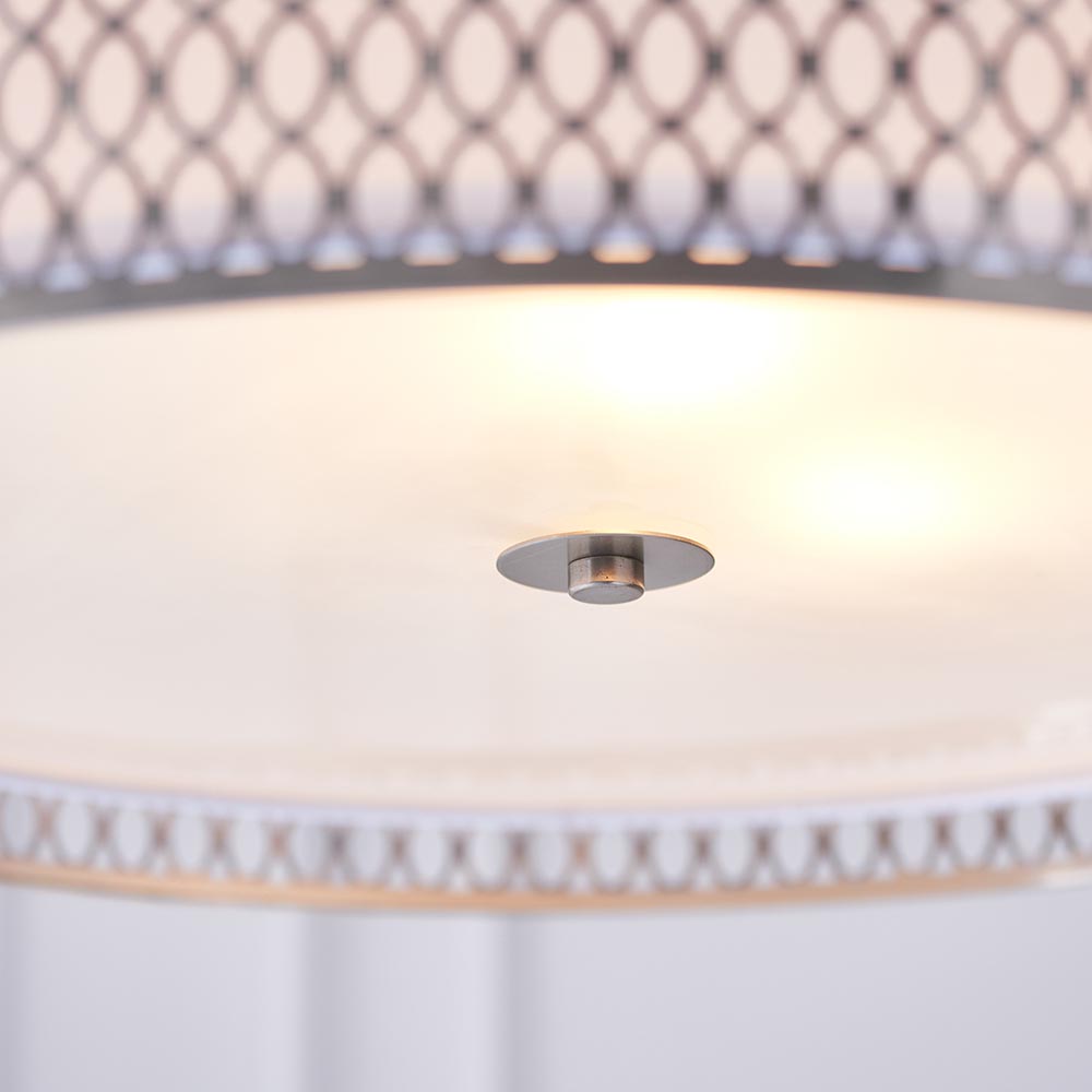 Close-up of the Endon Rosaline 3 Light Pendant showing the frosted glass diffuser, nickel centre fitting and geometric fretwork rim glowing softly above.