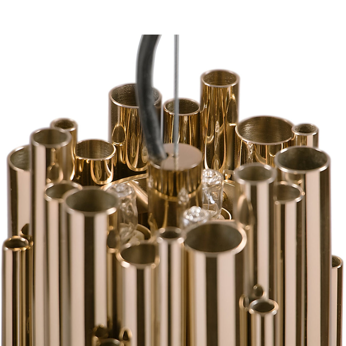 Close-up of the Aurelio 6 Light Brass Pendant - Gold, showcasing multiple shiny gold cylindrical tubes clustered together with visible black wires. This minimalist pendant brings elegant, modern style to any room.