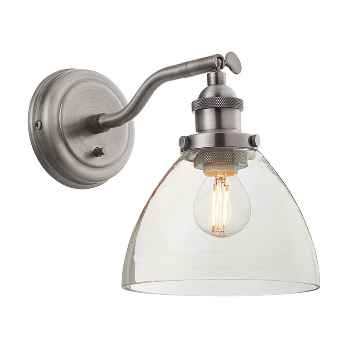 Wentworth Wall Light in silver, an industrial-style fixture with adjustable knuckle arm, knurled lamp holder and clear domed glass shade.