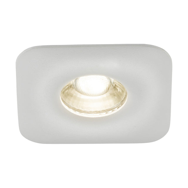 The Odina Single Dimmable Fixed Square Downlight in white features a central glowing bulb, crafted from durable die-cast aluminium and compatible with GU10 LED for efficient illumination.