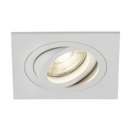 The Ambar Single Tilt Square Downlight - White showcases a sleek white frame with a centrally positioned, adjustable circular bulb, making it ideal for architectural lighting designs.