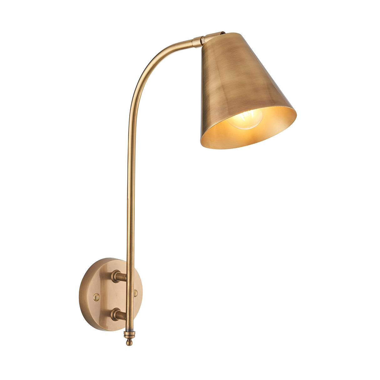 Chartmere single-light wall sconce in antique brass with curved arm, round bracket, and adjustable cone shade, shown lit on white background.