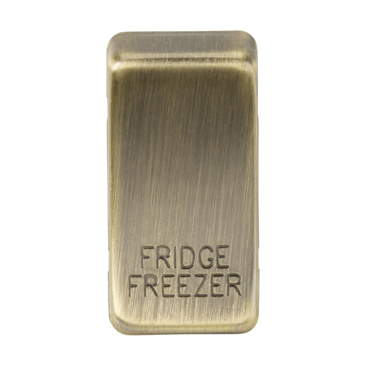 A close-up reveals a metallic, rectangular switch cover with an antique brass finish. The words "FRIDGE FREEZER" are prominently engraved, offering a classic and timeless appeal.