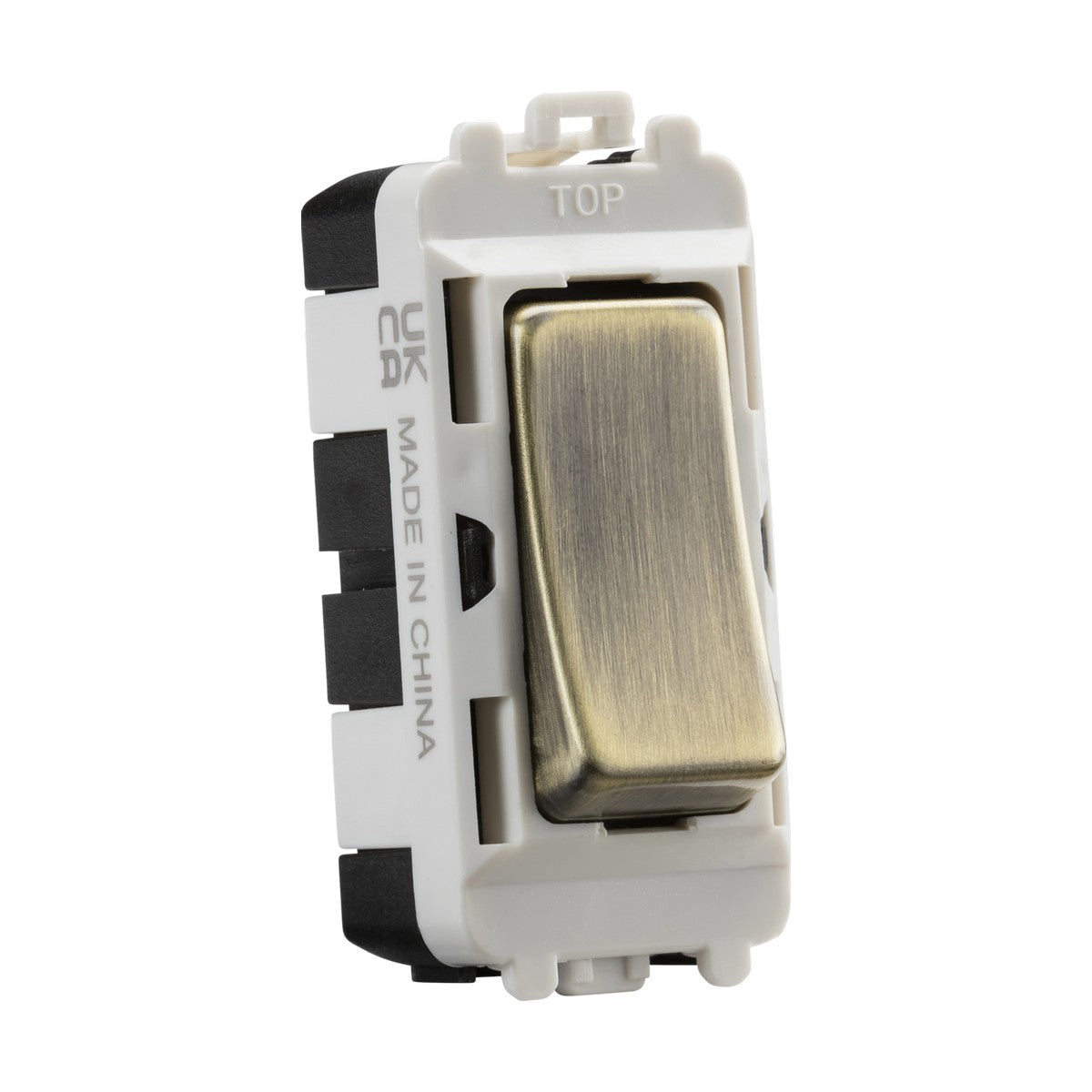 A close-up of the 20AX DP Grid Module in antique brass, featuring a white plastic frame. This component, part of the Knightsbridge Grid system, is labeled TOP and MADE IN CHINA on the side.