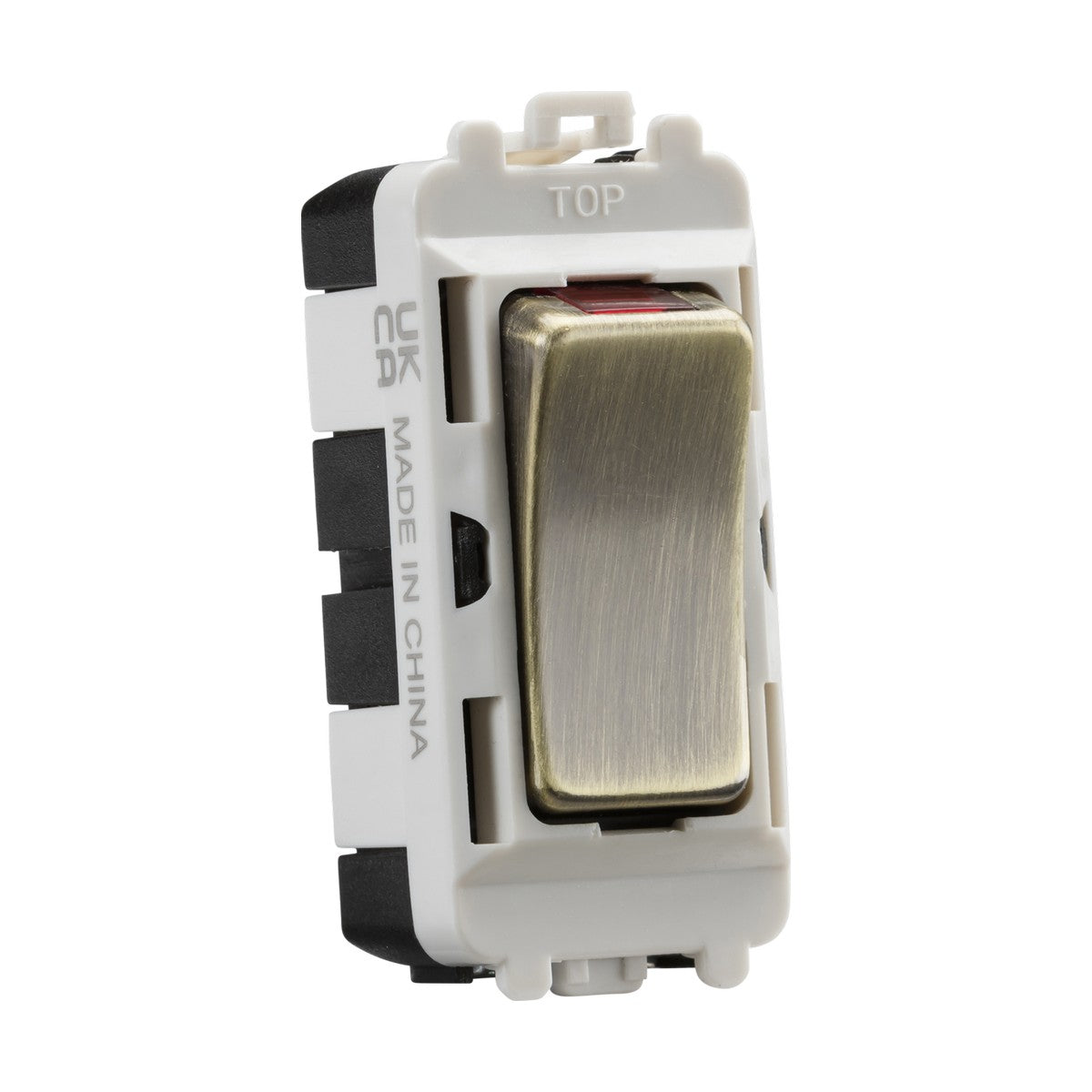 A rocker light switch in antique brass, designed for the Knightsbridge Grid system, features a white and black plastic frame. It includes markings of UK and Made in China, along with the word TOP on it.
