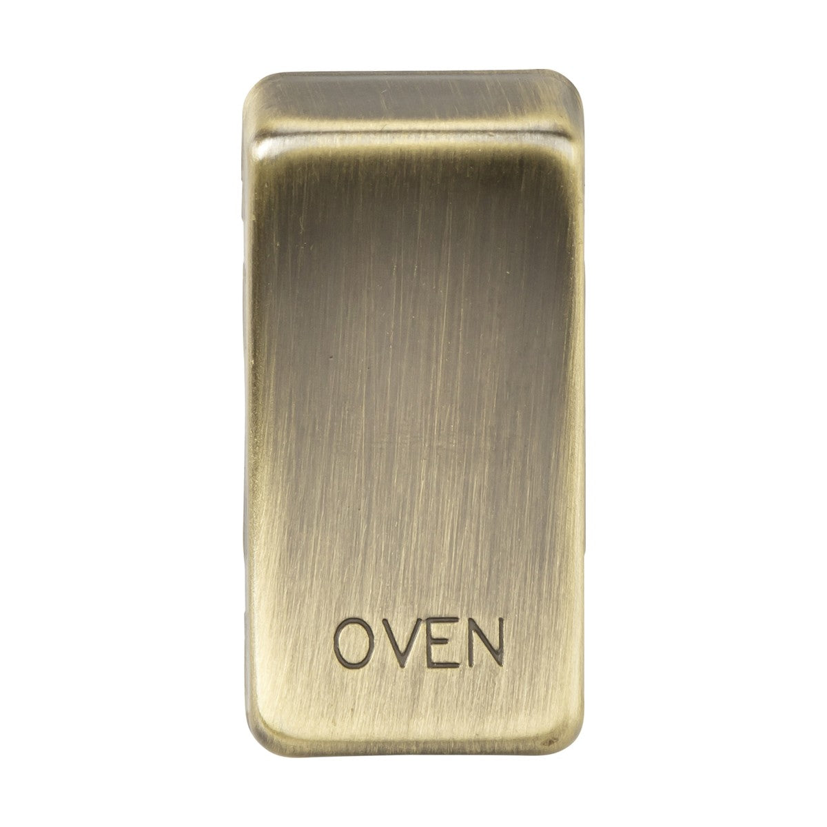 The Switch Cover "Marked OVEN" - Antique Brass is a rectangular metal cover with the word OVEN engraved in capital letters. Its brushed texture offers a vintage charm, reminiscent of classic rocker covers.