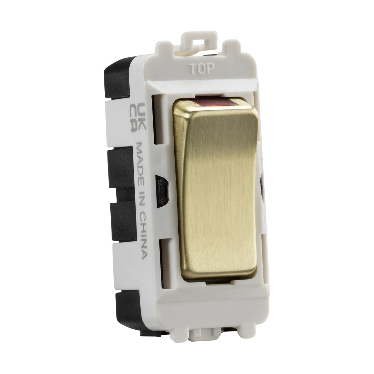 A close-up of a brushed brass decorative rocker switch with a white border, integrated into the Knightsbridge Grid System. The switch features TOP and MADE IN CHINA markings on its frame, known as the 20AX DP Grid Module With LED Indicator.