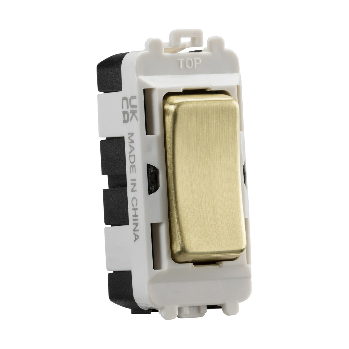 The 20AX 2 Way SP Module (Centre Off) - Brushed Brass features a brushed brass finish and a white plastic frame. It is labeled TOP and MADE IN CHINA, and is part of the Knightsbridge Grid system. This switch is designed for use in a modular system or wall plate.