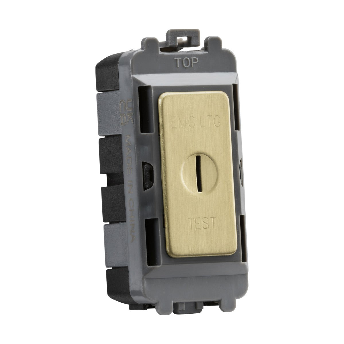 A close-up of a beige and gray electrical switch labeled EMG LTG with TEST engraved at the bottom. This 20AX 2 Way SP Key Module in brushed brass, compatible with the Knightsbridge Grid System, is upright in design, featuring MADE IN CHINA marked on the side for a sleek installation.