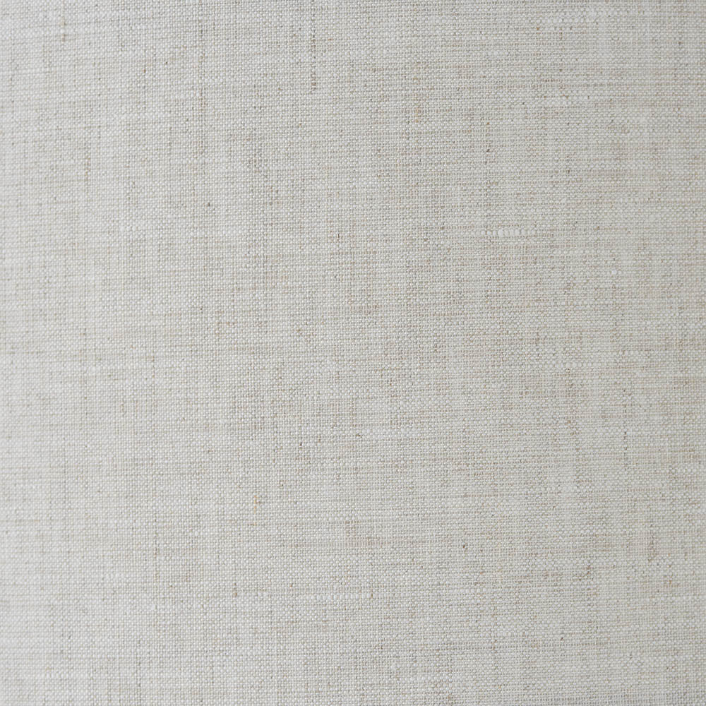 Close-up of natural linen fabric texture in light beige, representing the shade material used on the Brenley 2 Light Wall Light in chrome and brass.