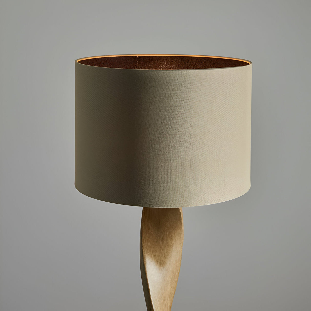 Endon Alcott floor lamp shown close-up with a natural linen cylinder shade and spiral oak effect base against a light grey background.