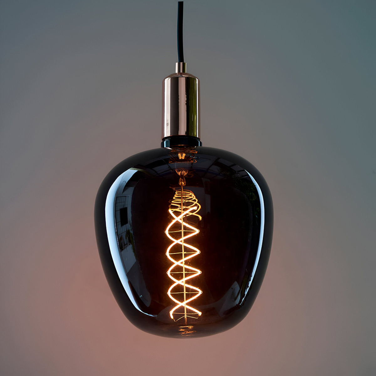 Endon 4W E27 LED filament helix bulb with smoked glass and warm white double-helix filament, suspended from a chrome pendant holder and black flex.