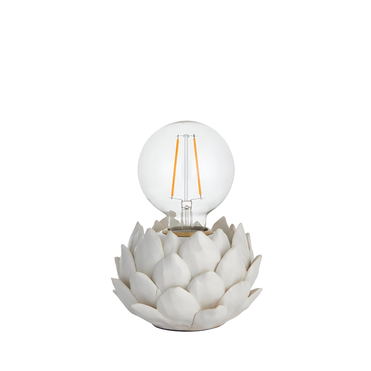 Aldgrove Table Lamp in white ceramic with a sculpted artichoke-shaped base and antique brass neck detail, shown with an E27 globe bulb on a plain background.