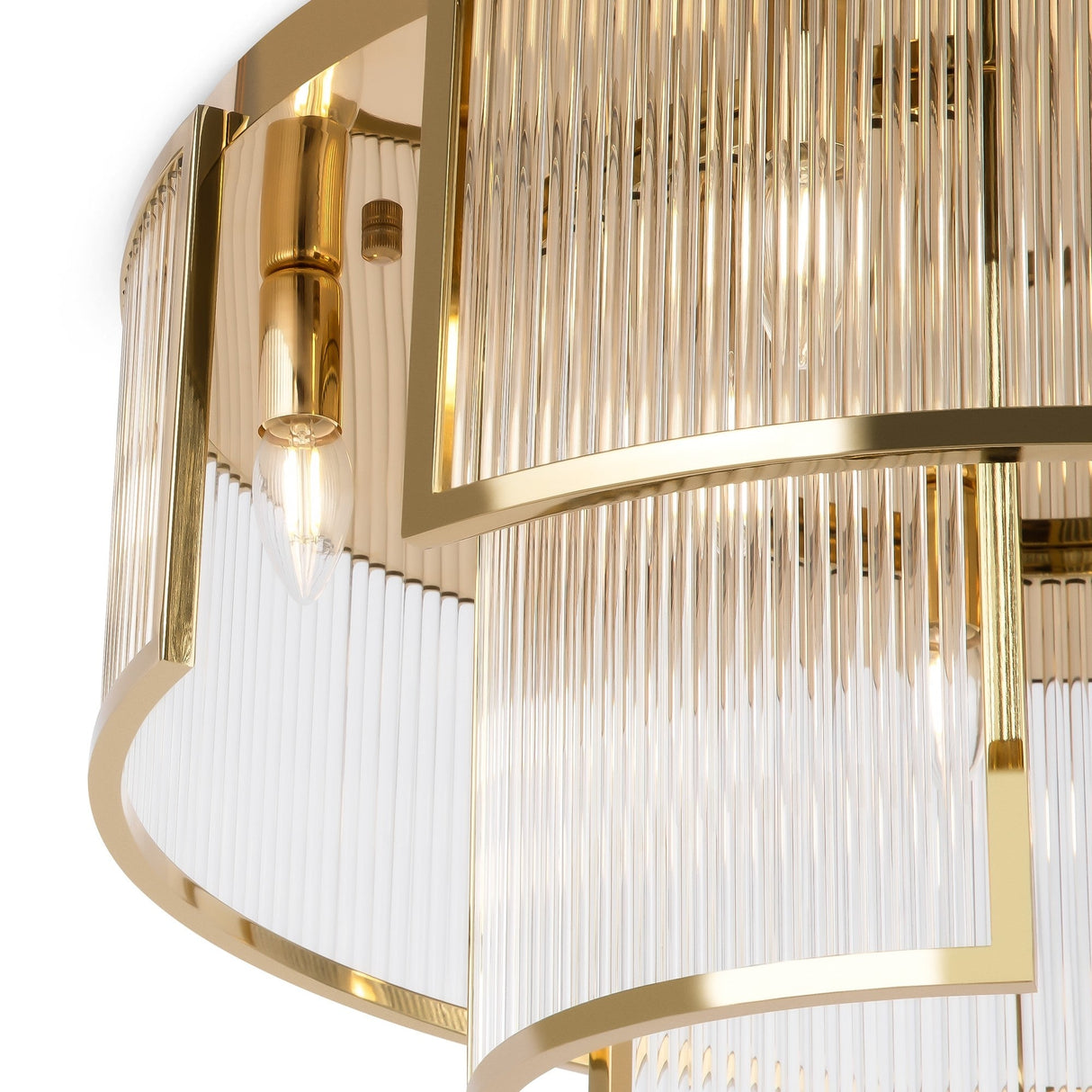 Close-up of the modern Frame 9 Light Flush - Gold chandelier, featuring circular gold frames and embossed glass tubes that encase light bulbs. This design exudes sophistication and elegance, casting a warm glow that embodies luxury lighting charm.