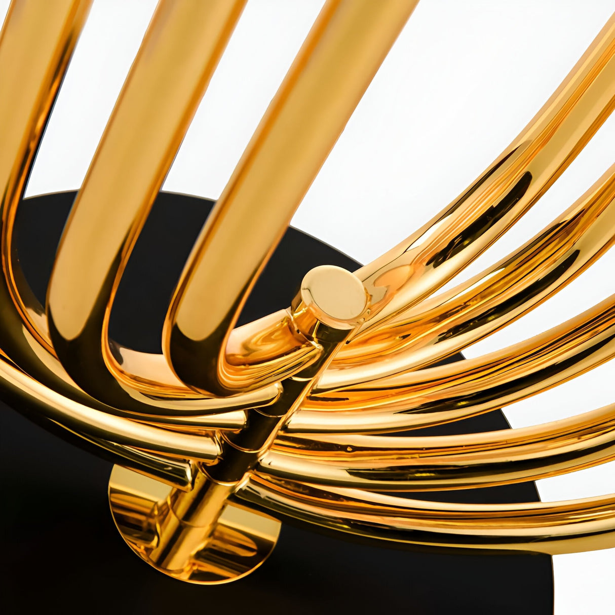 Close-up of the Ascot 4 Light Large Table Lamp in black and gold, featuring modern Art Deco design with curved tubular elements on a black base, set against a white background.