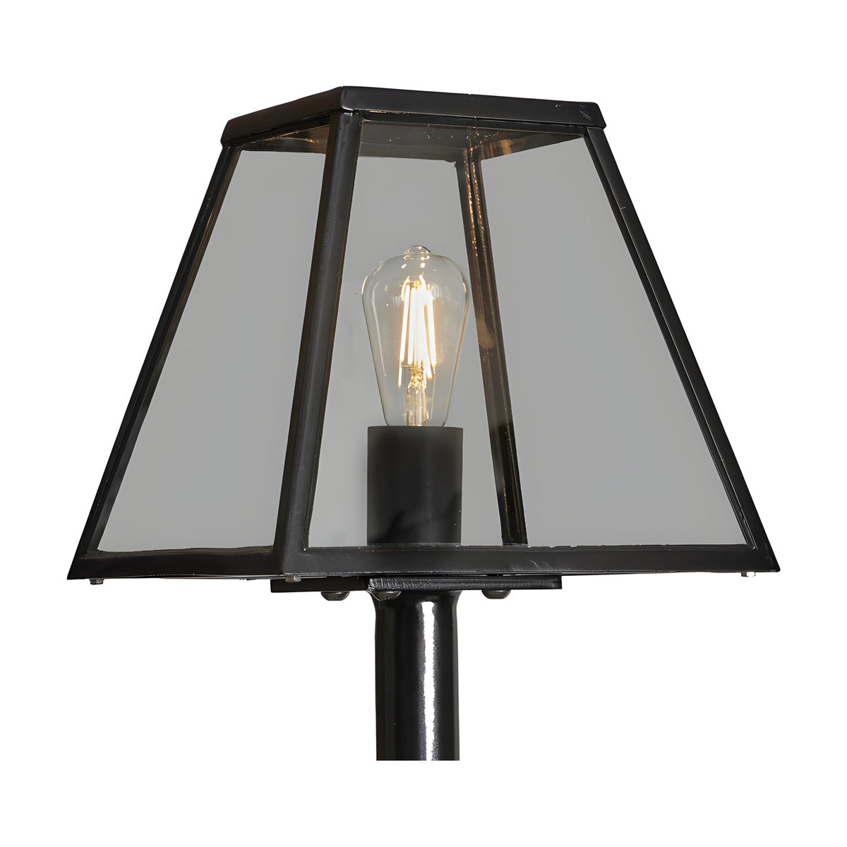 Close-up of the black galvanised steel lamp post's tapered lantern head with clear glass panels and an exposed Edison-style bulb, shown against a white background.
