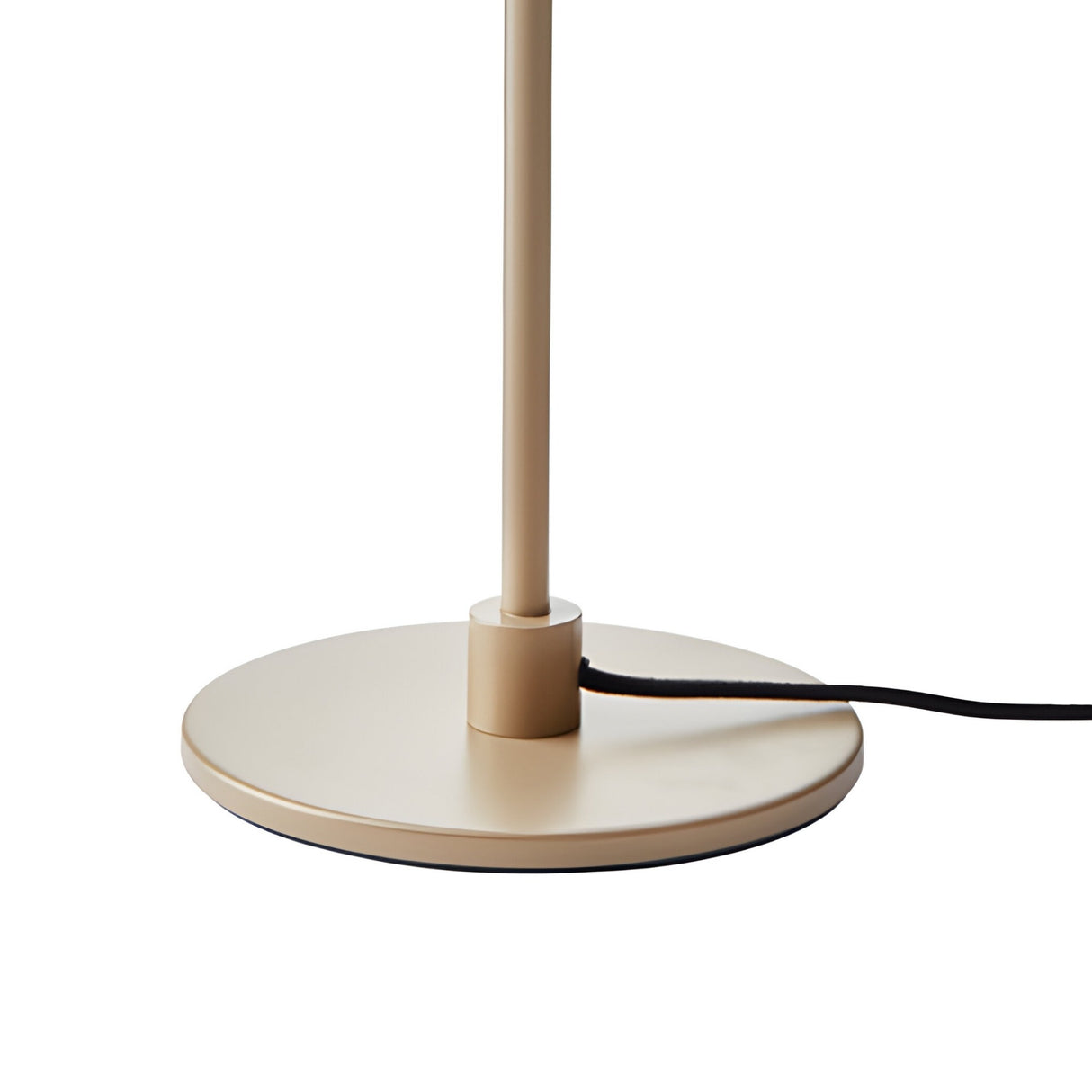 The Blossom LED Floor Lamp - Gold features a beige circular base with a central vertical pole and a black electrical cord, making it ideal for modern interiors against a white background.