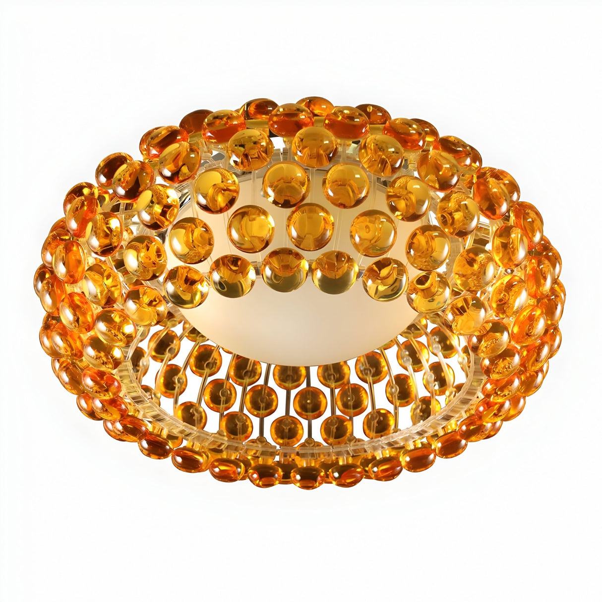 The Briller LED Ceiling Light - Gold features a round design with a reflective gold surface and amber-toned spheres in concentric rows, delivering luxurious illumination and sophisticated elegance to any space.