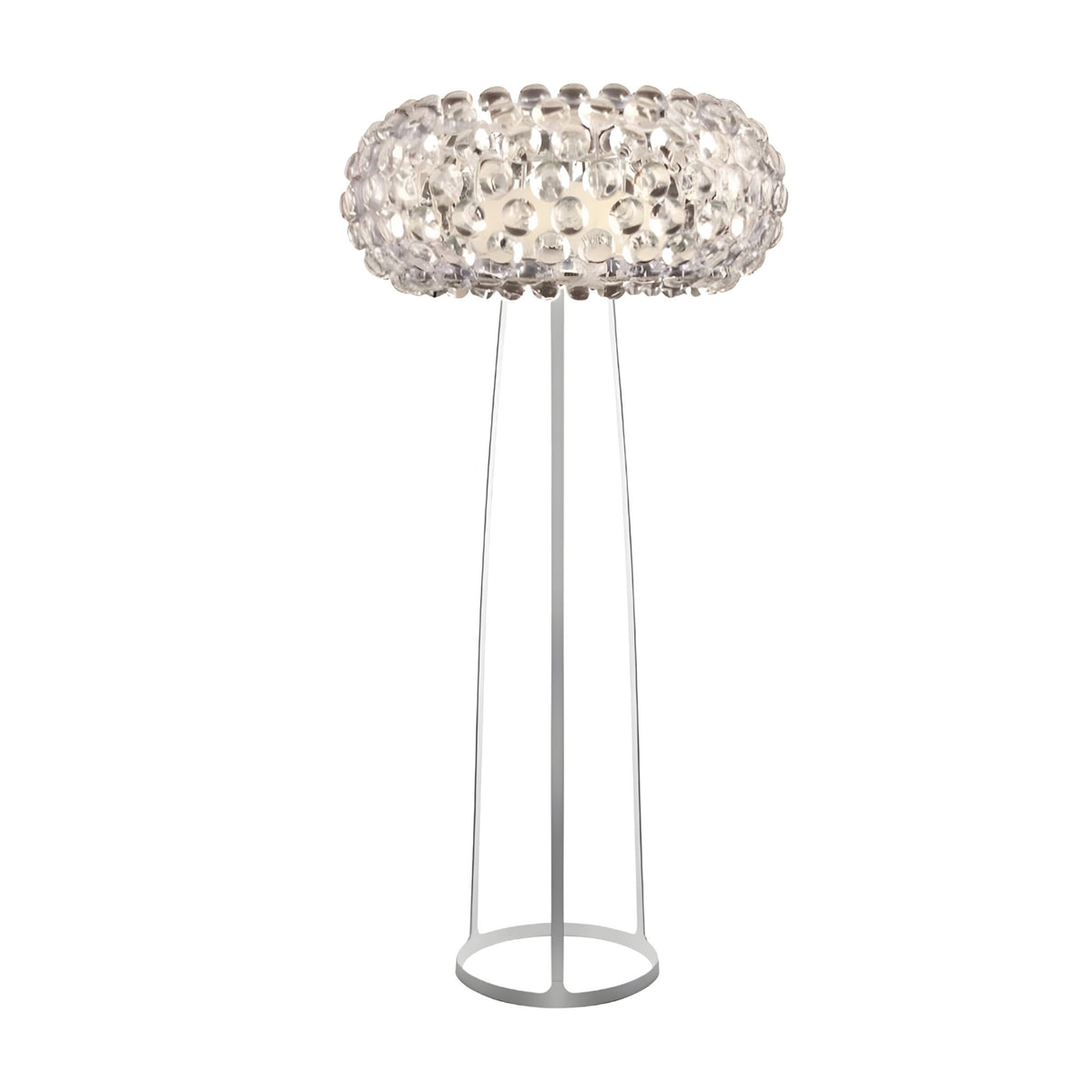 The Briller LED Floor Light - Transparent features a round, bubble-textured clear glass shade and a slim, tall silver tripod base, providing ambient lighting for any space.