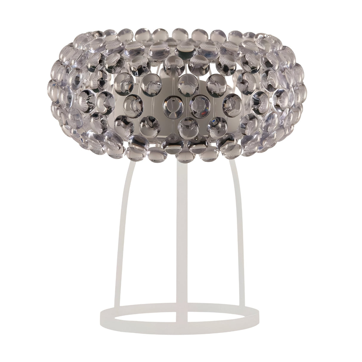 The Briller LED Table Lamp - Clear features a round, translucent shade of clustered clear glass beads on a sleek white metal base, offering modern luxury and elegant ambient lighting.